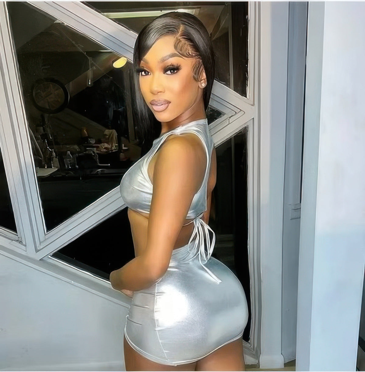 Model wearing the silver Ruched Metallic Open Dress